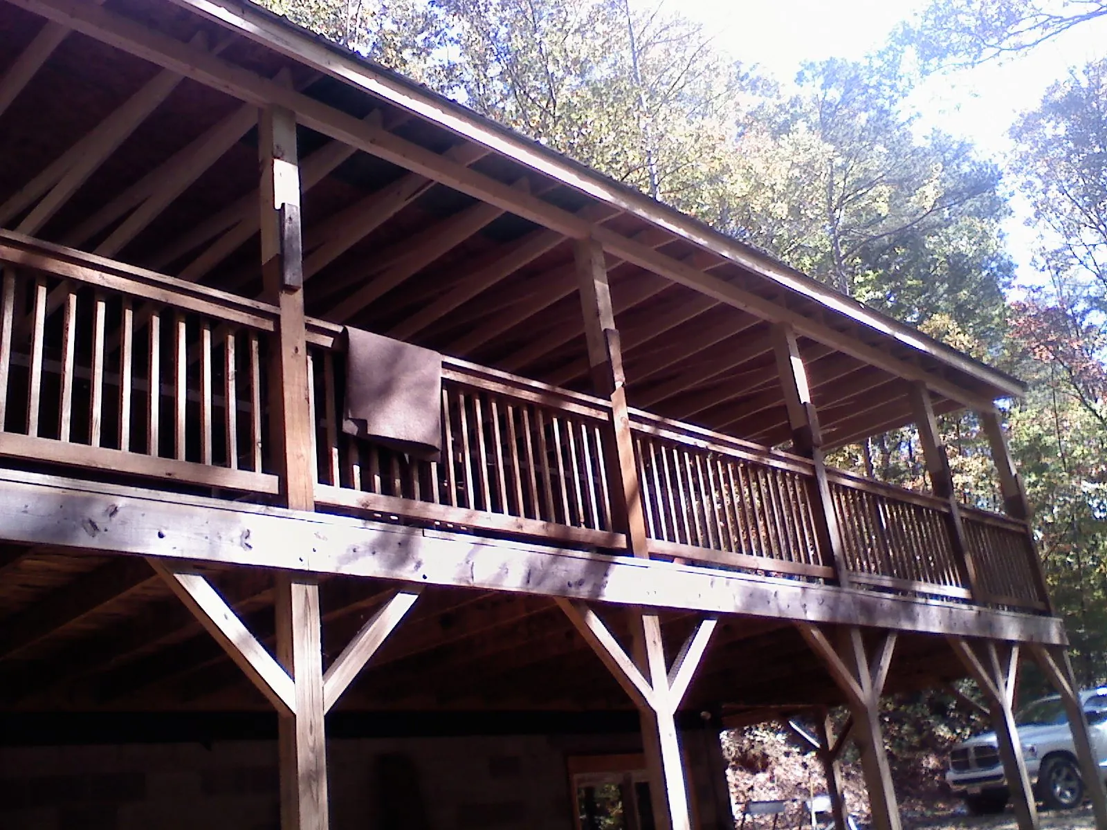 Timber framing under a new elevated porch and deck — Roof Leak Repair in Artesia by Roofing Brothers